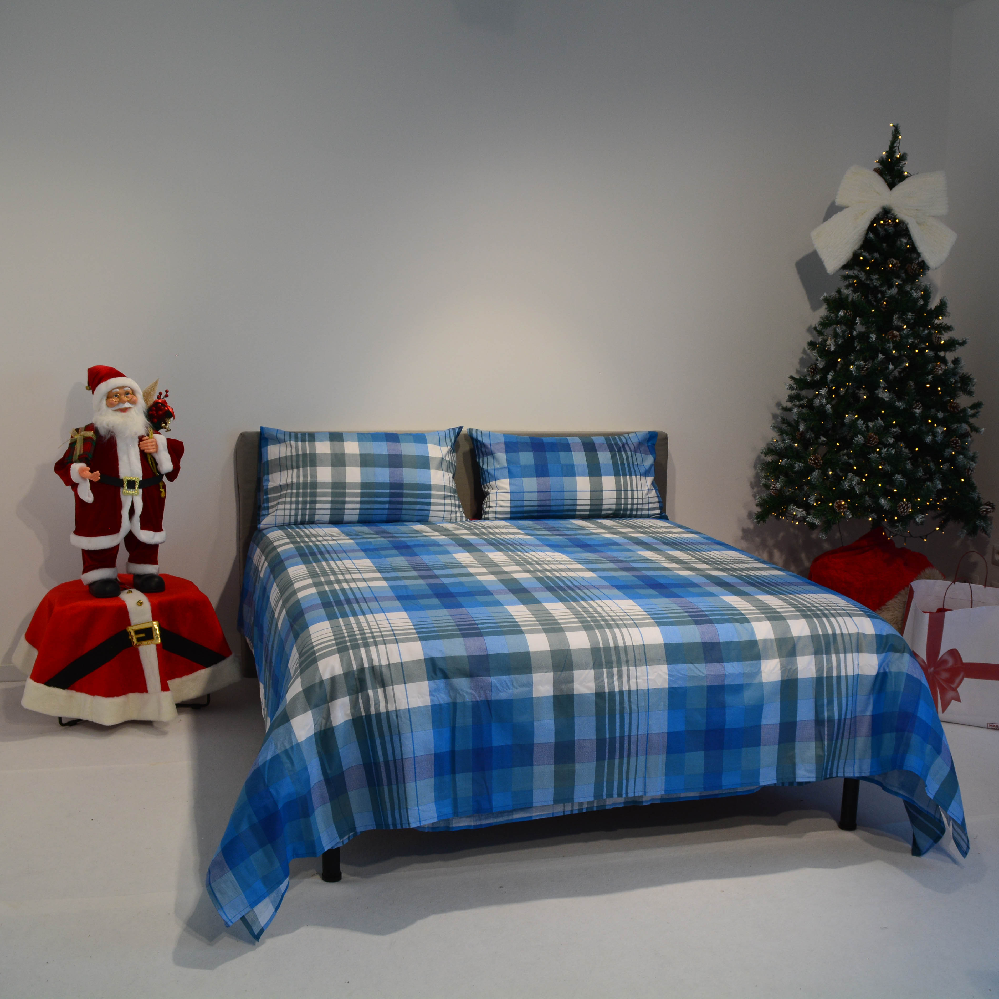 Delicata - la parure arrotolata - fantasia quadro blu